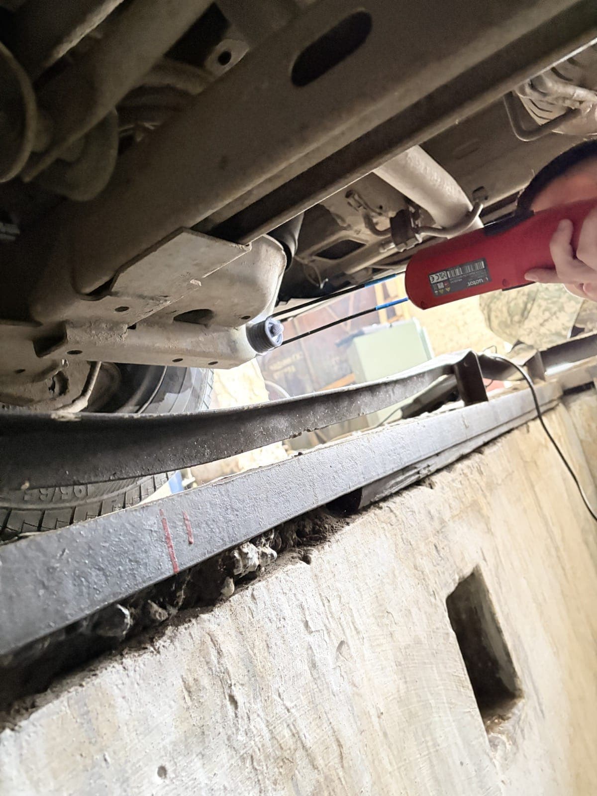 Vehicle repair work with a delivered induction heater