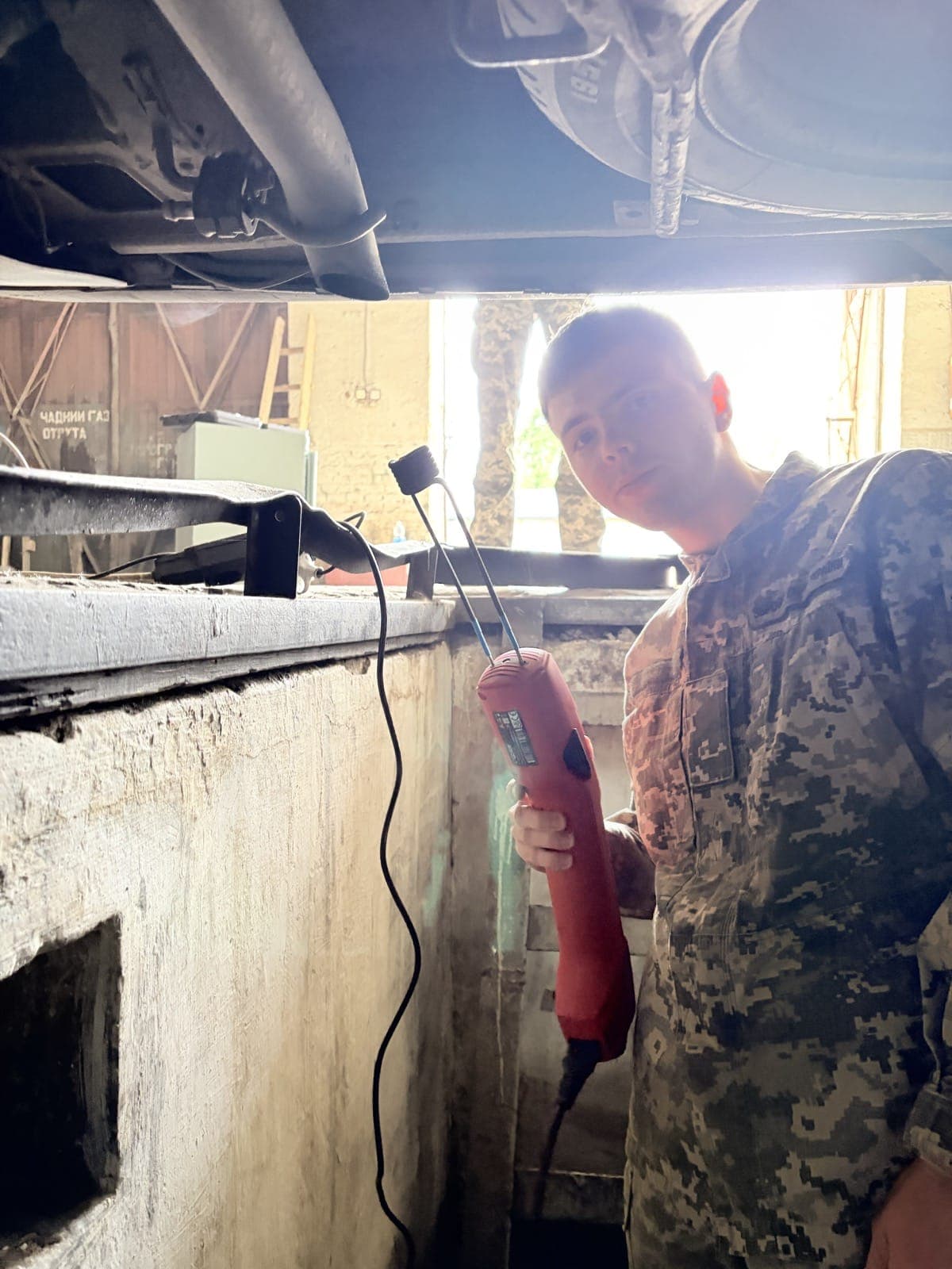 Repair team member using a delivered induction heater